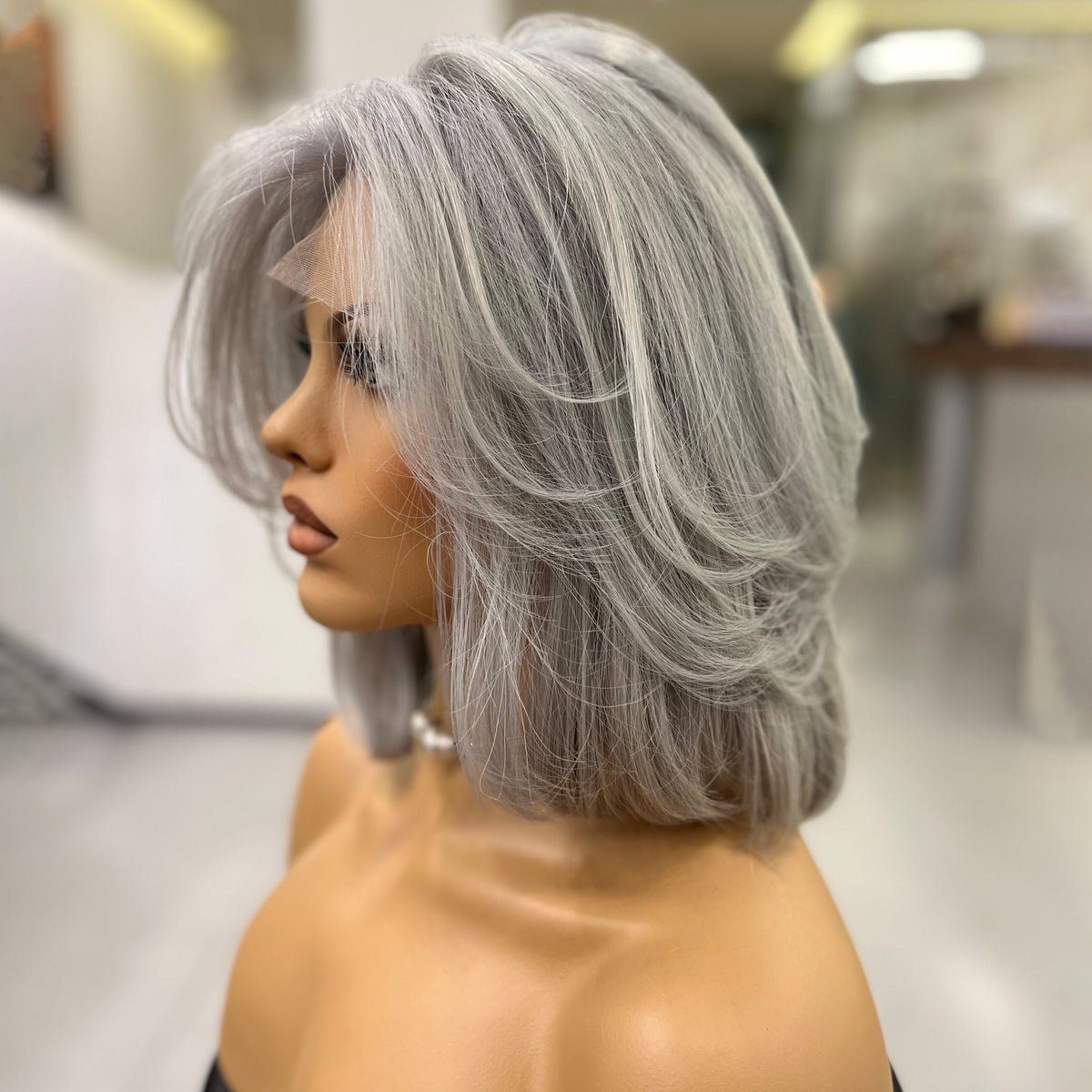 Colette wig side view silver grey soft layers movement Mongolian human hair